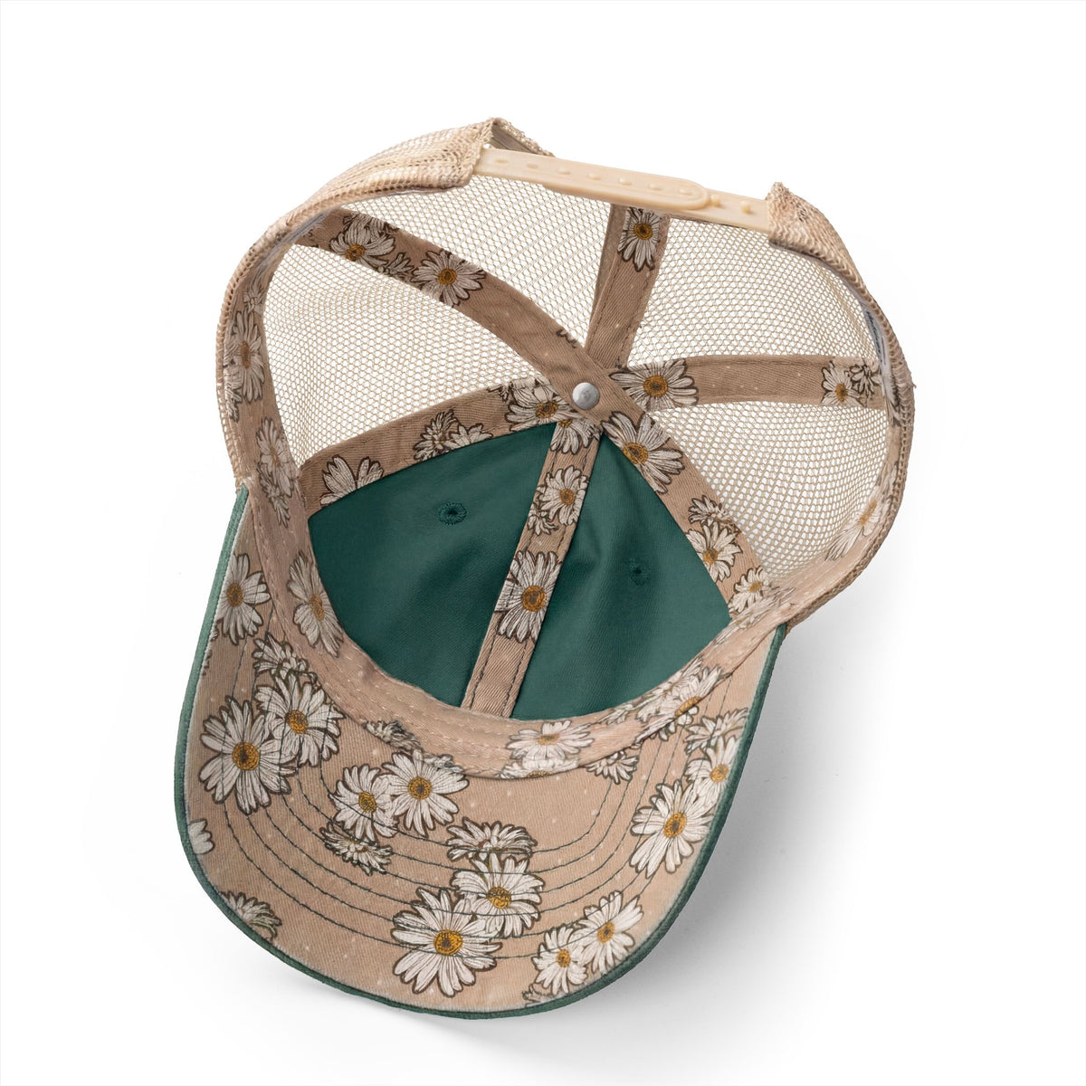 Beige cap with floral pattern and green interior on a white background