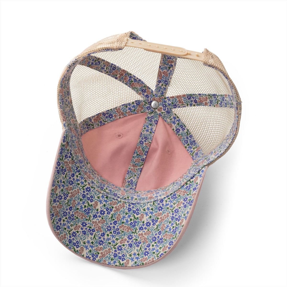 Floral-patterned cap with mesh back on a white background